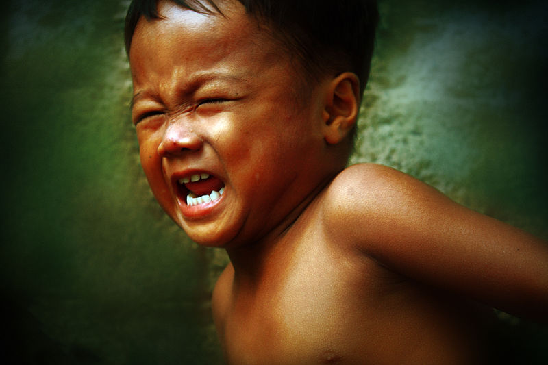 Photo of child crying angrily, by Allan Donque